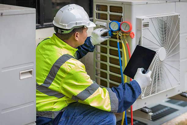 Professional Air Conditioning Repair technician working in Monroe, OR